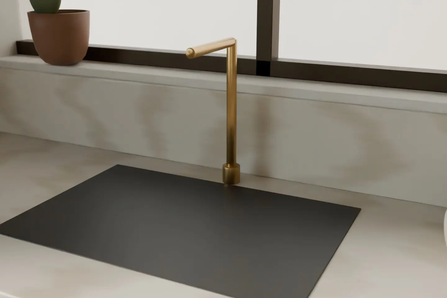 Concept render of a brushed brass tap over an undermount sink in a pale stone worktop