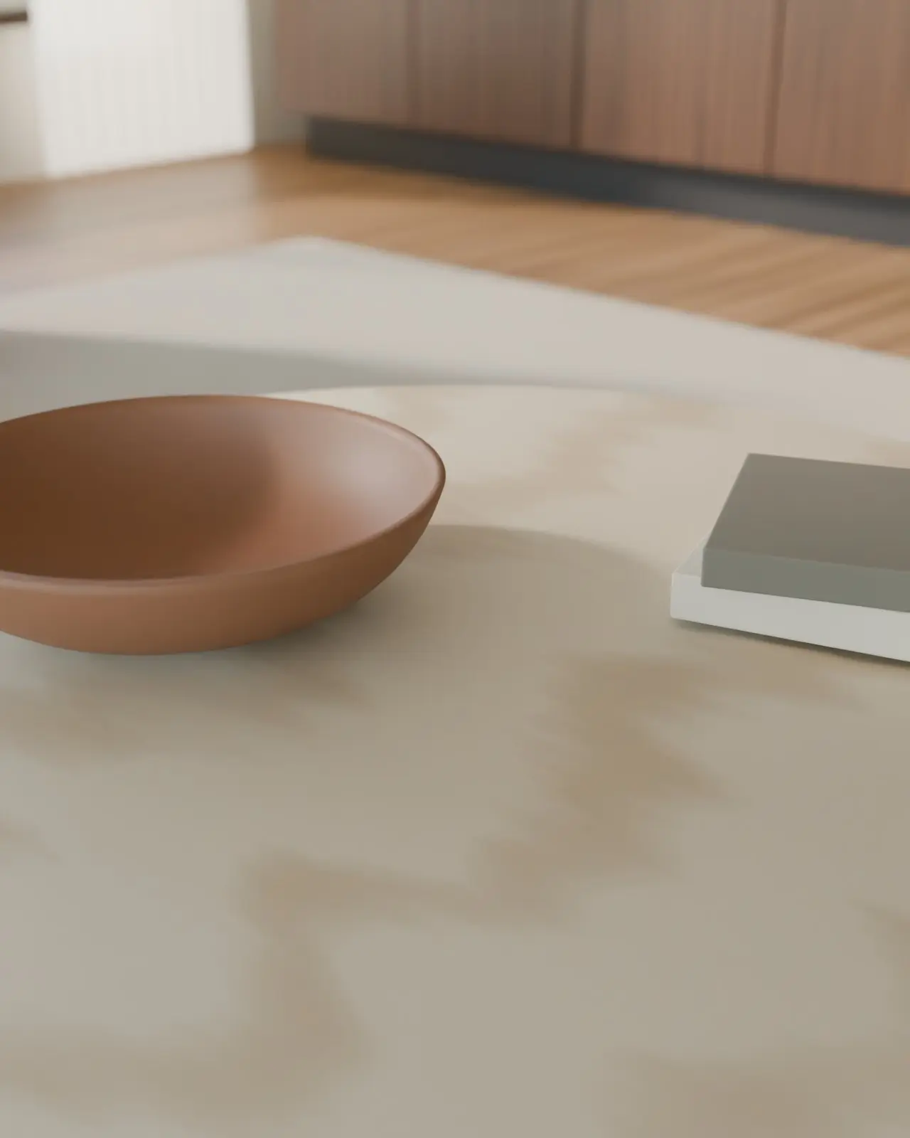 Concept render: the honed stone top of the living-room table