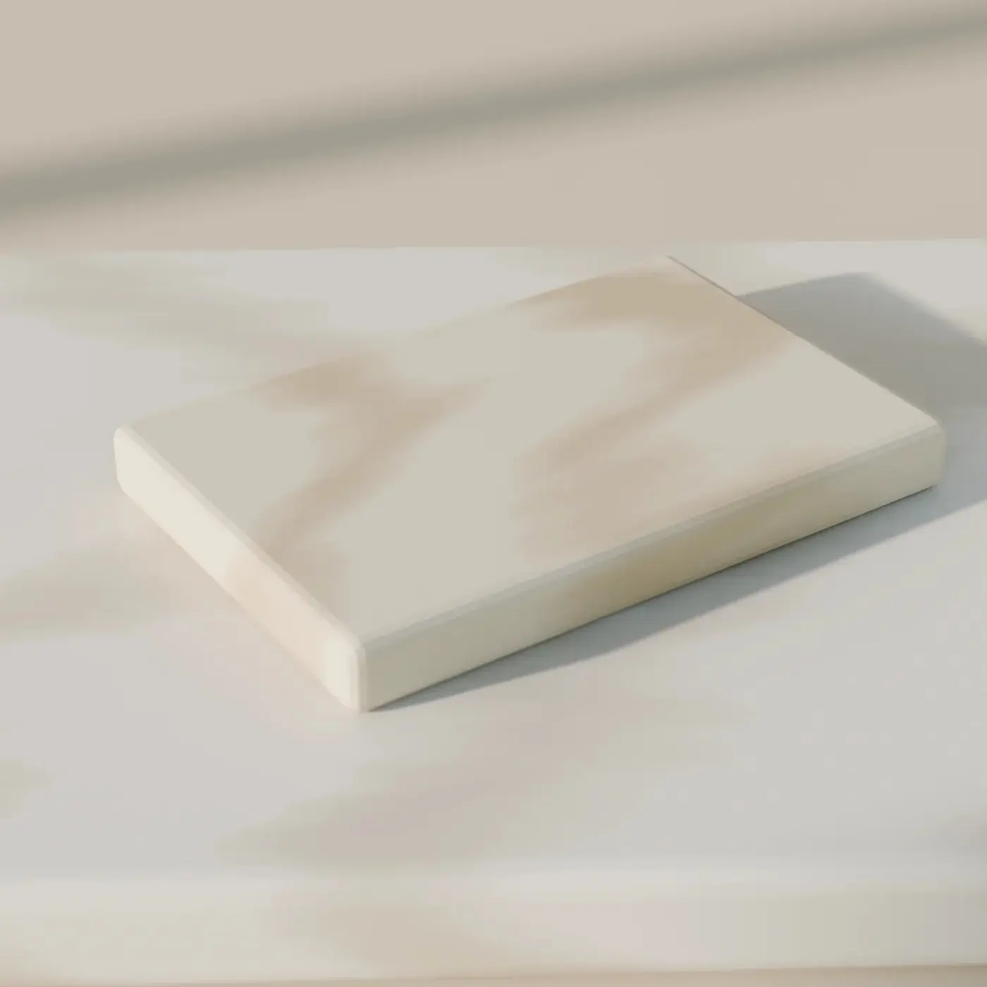 Concept render of a honed pale stone sample