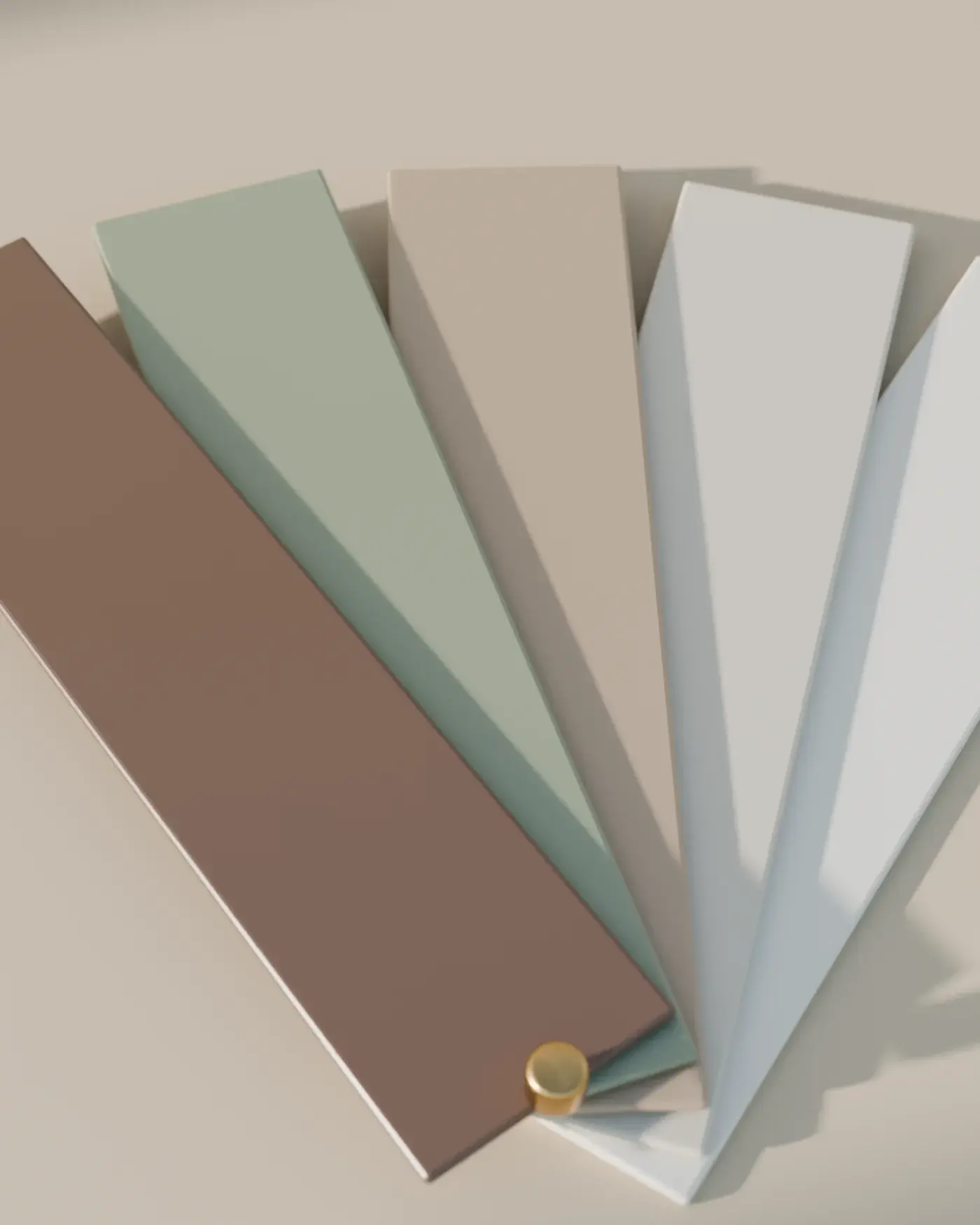 A fan of matte lacquer samples in bone, putty, clay, sage and umber