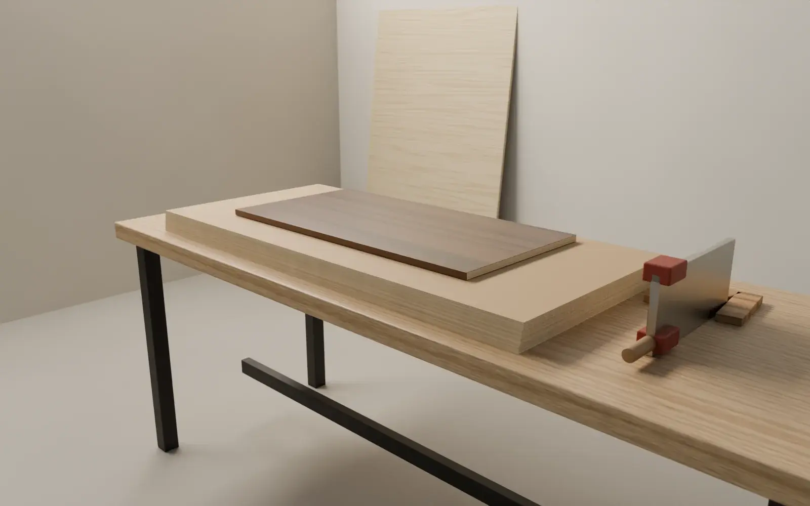 A workshop bench with stacked plywood sheets, a walnut-faced panel, a clamp and a steel rule